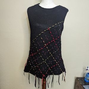 Simon Chang Black Sleeveless Sweater with Criss Cross Detailing.